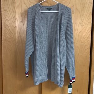 Grey cardigan with striped sleeves
